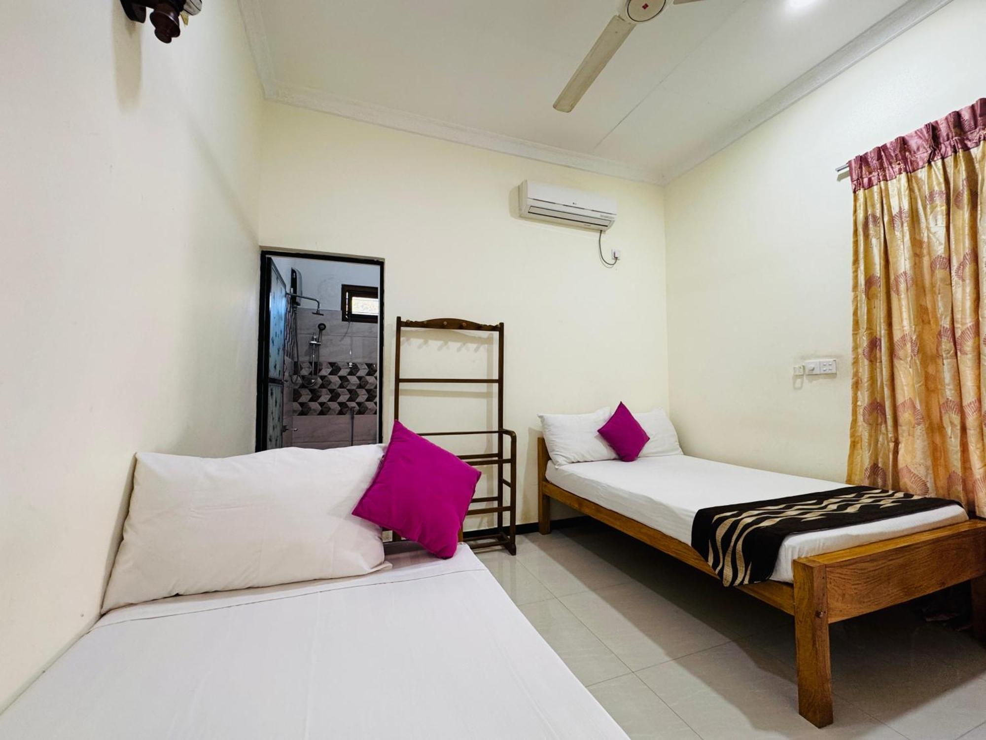 Aa Inn Trincomalee Pokoj fotografie