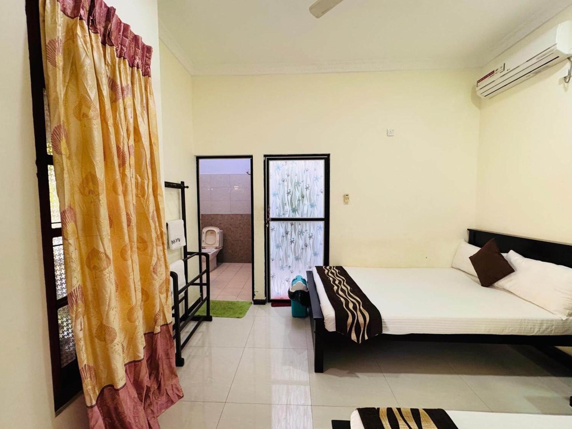 Aa Inn Trincomalee Pokoj fotografie